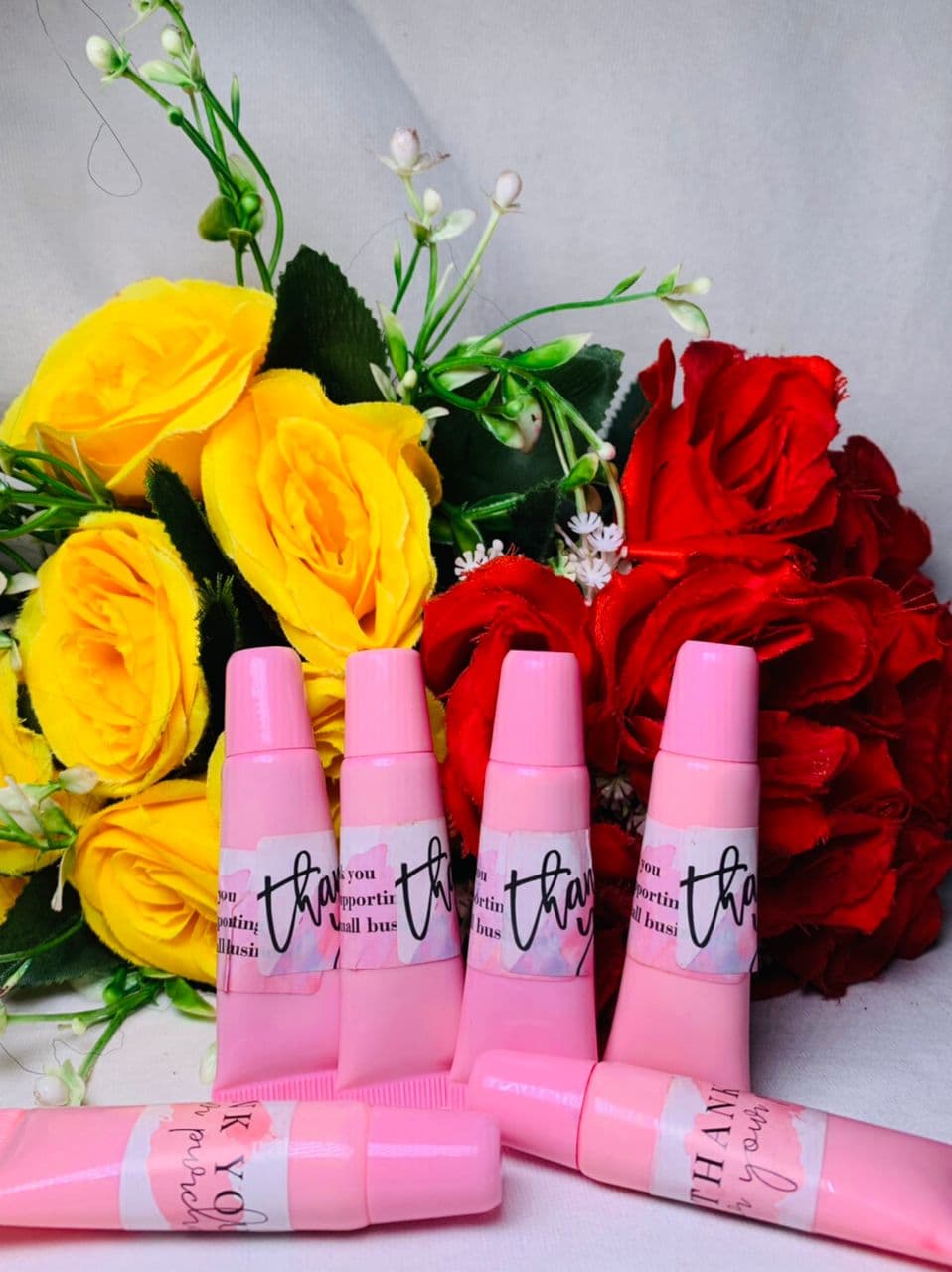 pink lip balm in tube form